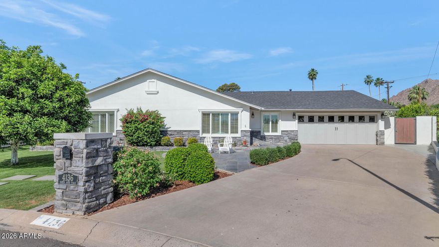 This darling cottage style home is perfect for the growing family, empty nesters looking to downsize or even a second home for those looking to winter in The Valley. The excellent floor plan houses a great looking island kitchen with fresh white cabinets, granite countertops and stainless-steel appliances, 2 family rooms, formal and informal dining areas, a custom-built office, and four oversized bedrooms including a beautiful primary suite with a soaking tub and large closet. French doors lead from the kitchen to the backyard which features a lovely, covered patio overlooking the pool, a large entertaining area with a built-in barbecue and fire pit, and a huge grassy yard. The home's special finishes include wood flooring, custom lighting, built-in cabinetry, plantation shutters and decorative marble and tile accents. Located in a fantastic cul-de-sac, this is a fabulous opportunity to move to a wonderful street on a great stretch of Arcadia Proper!