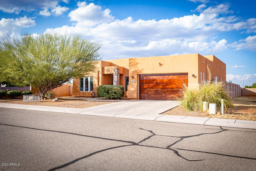 Beautiful Walston home on a corner lot. Come home to the stunning kitchen with custom cabinetry with roll our shelves and under cabinet lighting and granite throughout. Enjoy your double sided fireplace in the family room or on the patio. Built in grill for grilling on those perfect weather days Arizonians enjoy. Be close to shopping and base. Home offers 3 bedrooms 2.5 baths and a den which could be a 4th bedroom. Call today to get your private showing.