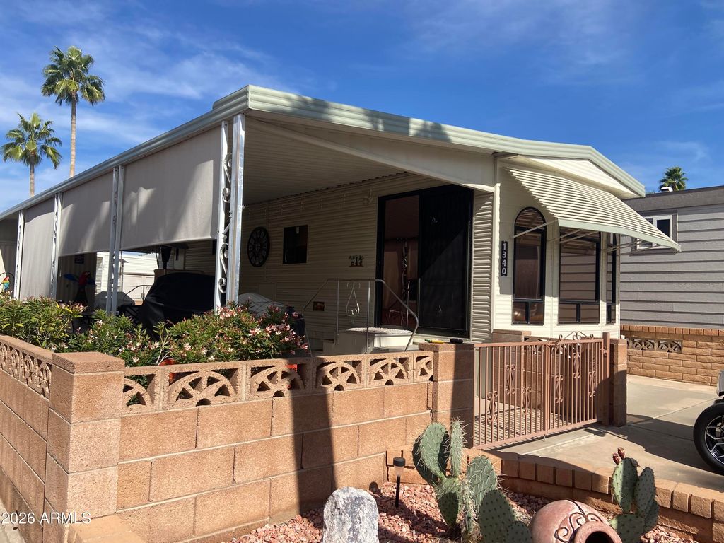 Photo of 1340 W Inuit Avenue, Apache Junction, AZ 85119 (MLS # 6982633)