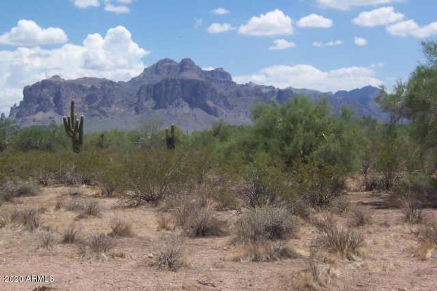 ''Superstition Mountain Estates''. 1.25ac Gross/just under 1ac per tax records...  Ready to Build,  Lot HAS POWER & AZ Water Tap, SRP Electric Underground to lot. Owner has building Plans ready to build a 2700-SqFt, (5)Bedrooms, (3)Bathrooms, Home &/or 2300sf 3bd2.5ba with Oversized garage attached or detached with room to build a separate Guest House..!  PRICE REDUCED - Owner Motivated..!