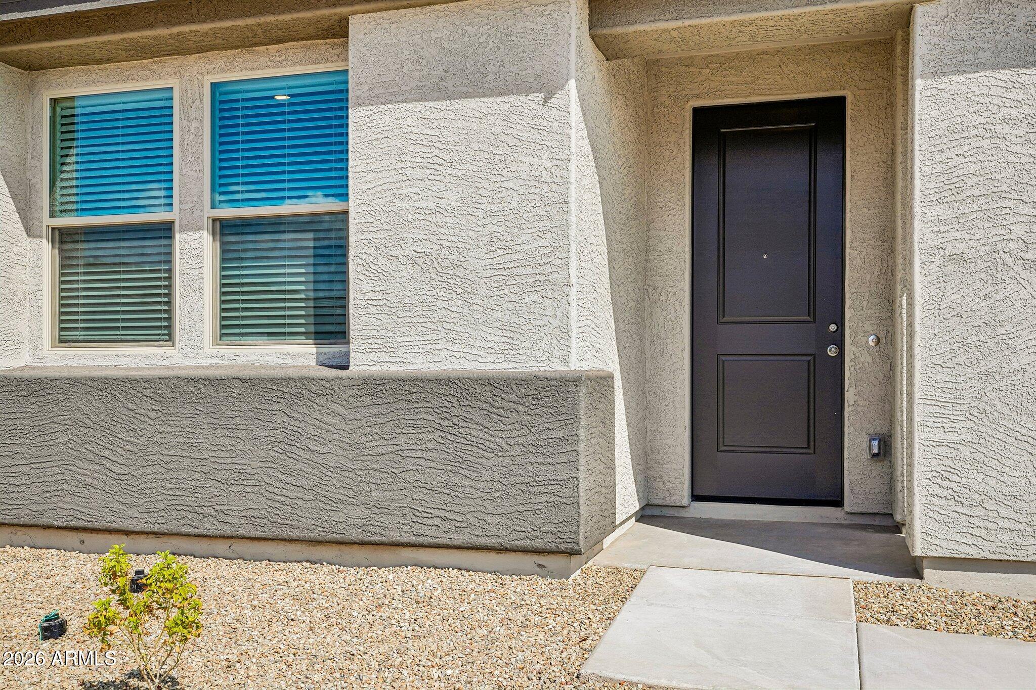 9640 W TAMARISK Avenue