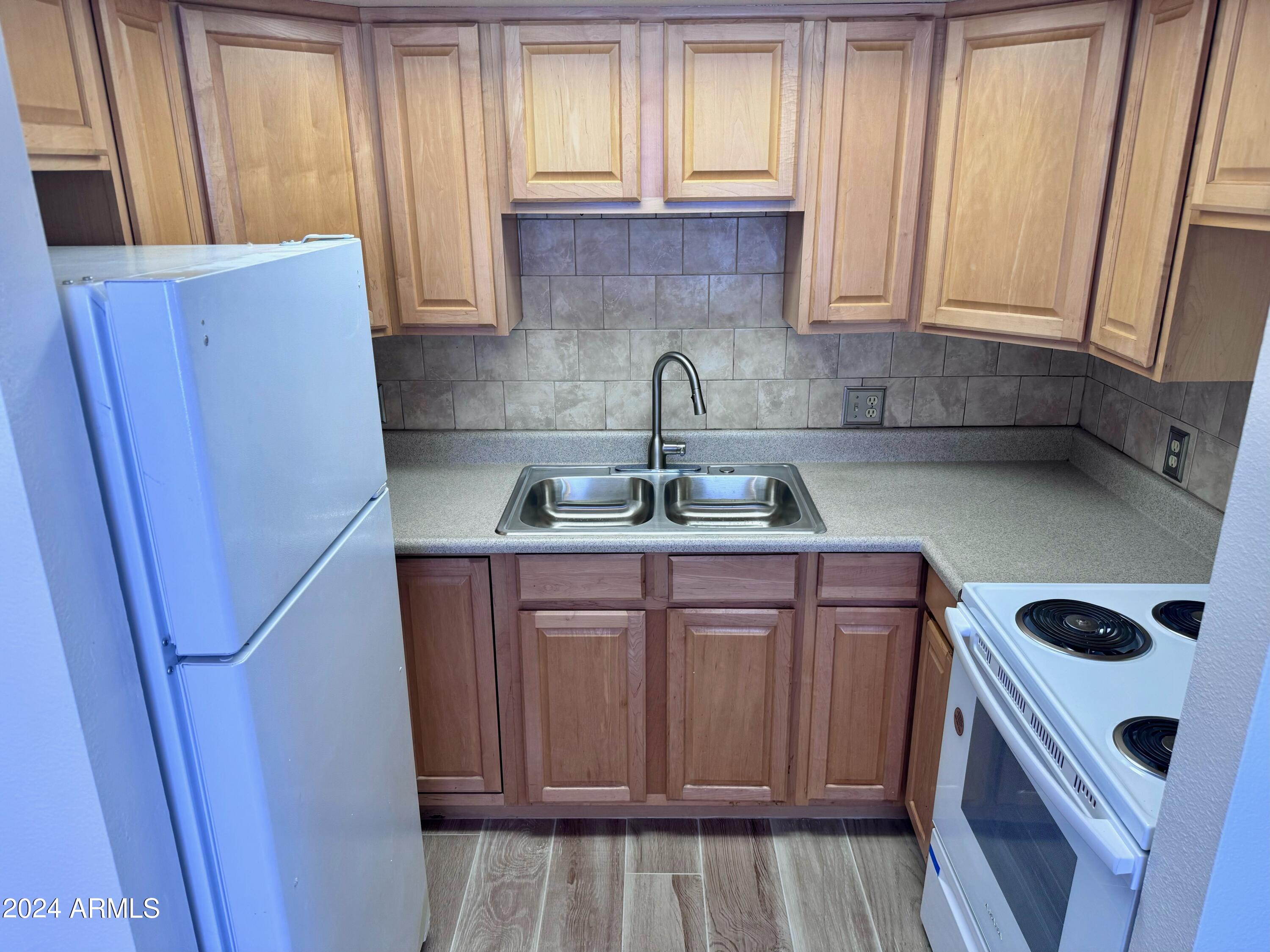 700 W UNIVERSITY Drive 203