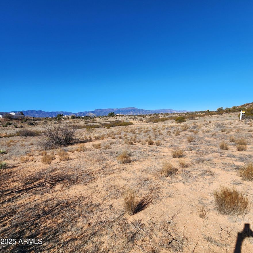 Beautiful 2.93 acres of serenity with panoramic views. There is a well on the property & a Perc test has been completed. Build your dream home or Seller has previous plans available upon request for a 3 bed /2 bath home. The lot is surrounded by custom built home in an established area.