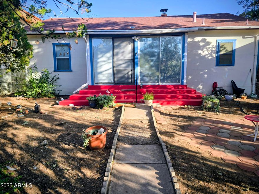 Secluded home in Desirable Warren. Tucked in mature vegetation, home offers original details and great location. 3 bedrooms and 1 1/2 bath, large open dining/living area has a fireplace with original hard wood floors. Tons of Storage and rear parking. Upgraded electric and plumbing. Walking distance to food, shopping, farmers market and the historic Warren Ball Park. Must see this home filled with Bisbee charm. possibility of property being converted to commercial.