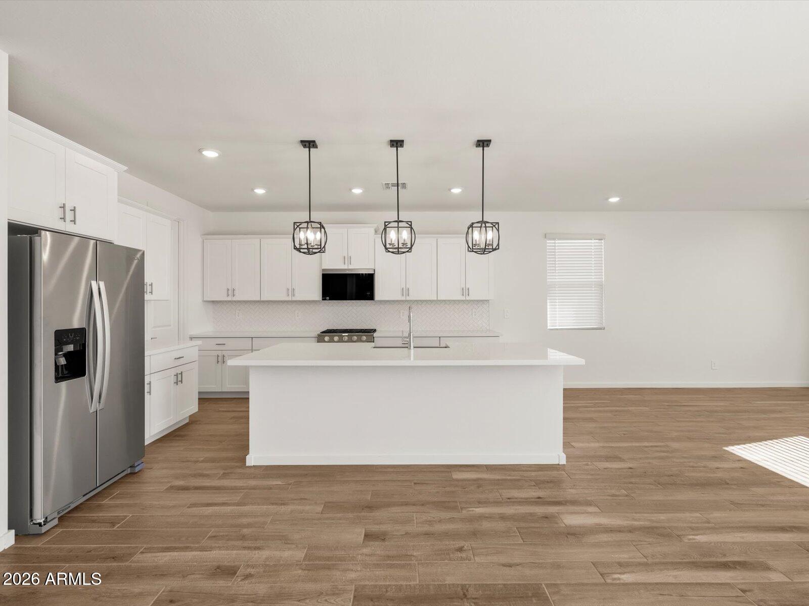 30589 W HACKBERRY Lane