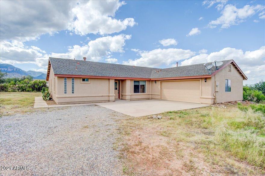 1 acre corner lot in Hereford! 3 bedroom 2 bath site built home with partial walled in back yard. Master suite with access to back patio. 2 living spaces and gas fire place. Freshly painted inside and out 2021. Beautiful panoramic mountain views you won't want to miss. Call today for your private showing.
