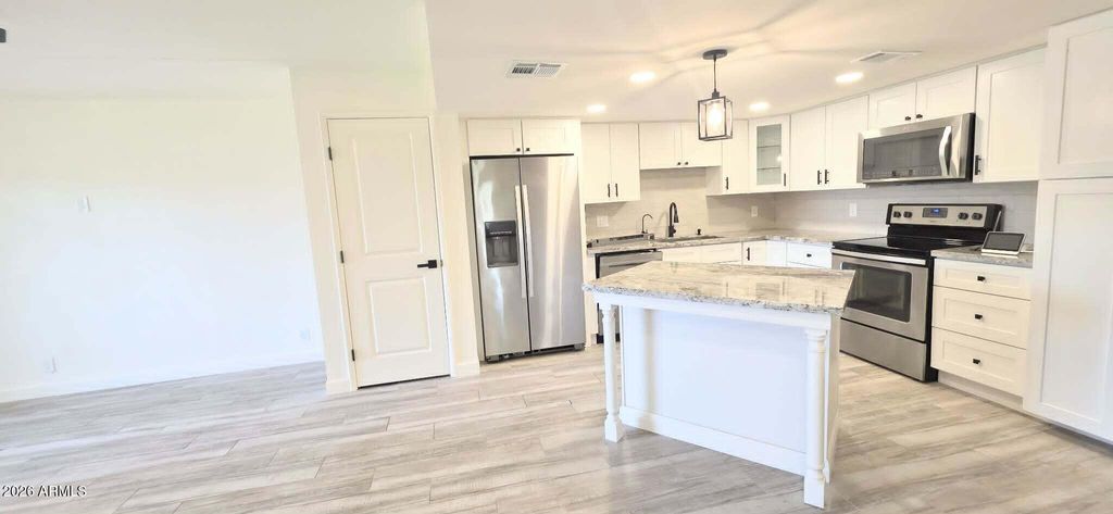 Photo of 7910 E Camelback Road #104, Scottsdale, AZ 85251 (MLS # 7025603)