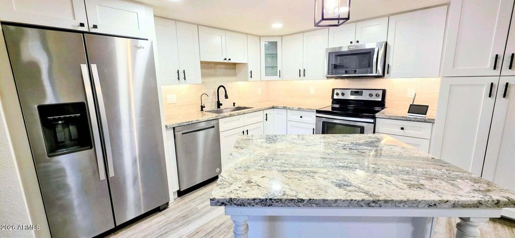 Photo of 7910 E Camelback Road #104, Scottsdale, AZ 85251 (MLS # 7025603)