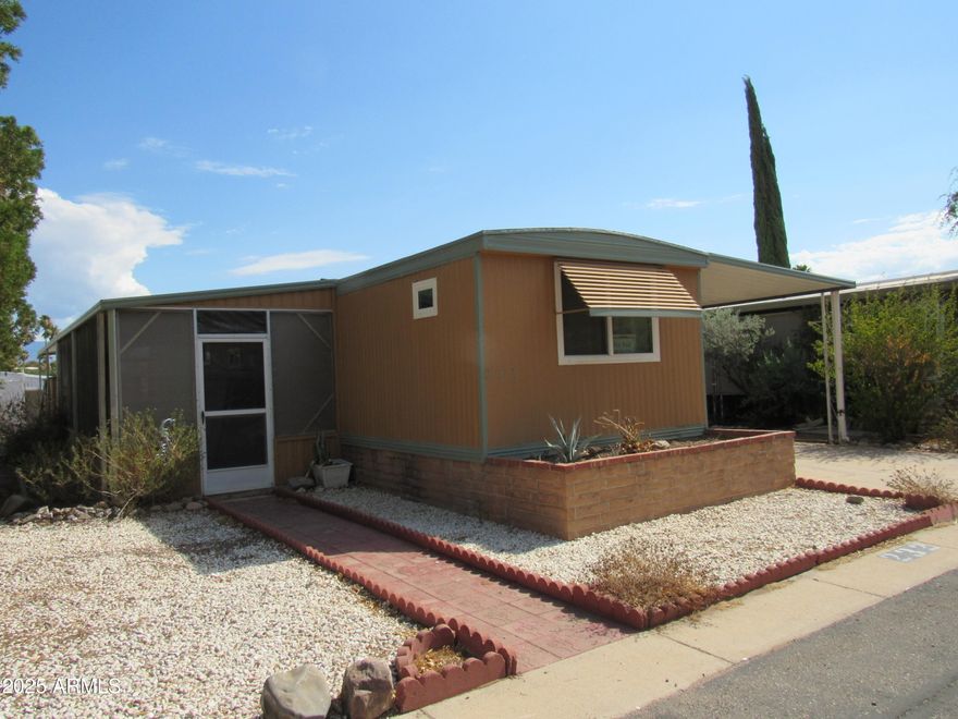 Located on a quiet street this charming home has a large yard and screened porch.
Late 2021 home was remodeled, new appliances, new windows, new floors, tape and textured walls.  New track lights and under counter lights. Drapes stay.
Awnings on all windows, 6 skylights.  Large shed at end of carport. 
Move in care-free. 
55+