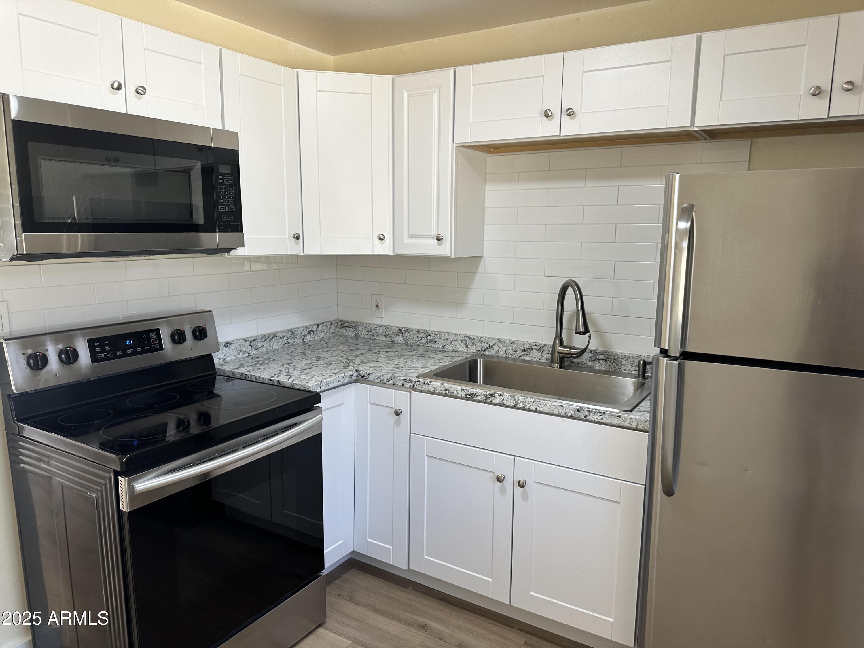 7234 E BELLEVIEW Street