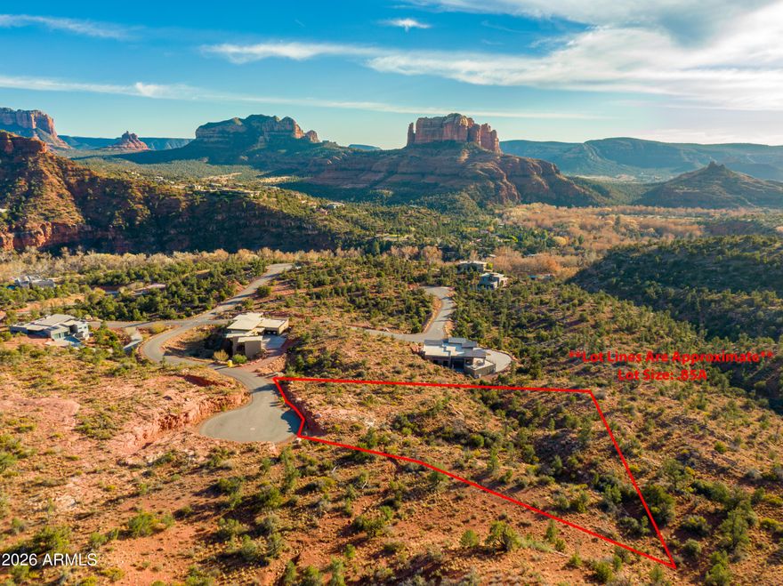 Create your own private retreat on this exceptional 0.85-acre lot in Sedona's prestigious gated Mystic Heights subdivision. Tucked away against the sprawling National Forest, this property offers unlimited access to nature and a front-row seat to Sedona's renowned red rock panoramas. Mystic Heights is more than a neighborhood—it's a lifestyle. Imagine stepping out your back door to explore endless trails that wind through the forest, perfect for hiking and mountain biking adventures. Nearby Oak Creek calls your name with its cool waters, while Sedona's vibrant town center provides an enticing mix of boutique shopping, art galleries, and fine dining, just minutes away. Surrounded by lush desert vegetation and stunning natural beauty, this lot is the ultimate canvas!