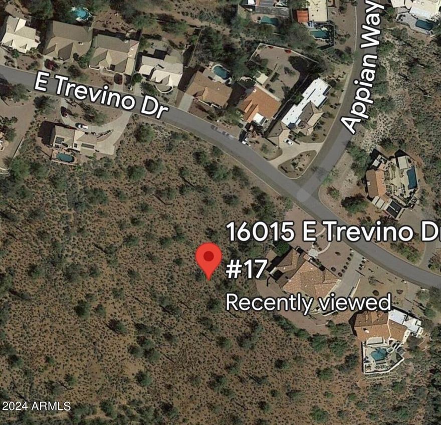 This lot offers views of both the Red Mountain and Four Peaks. Can also see sea city lights. Lot is directly across fro Firerock County Club with view of several fairways. Great elevation in this million dollar community.