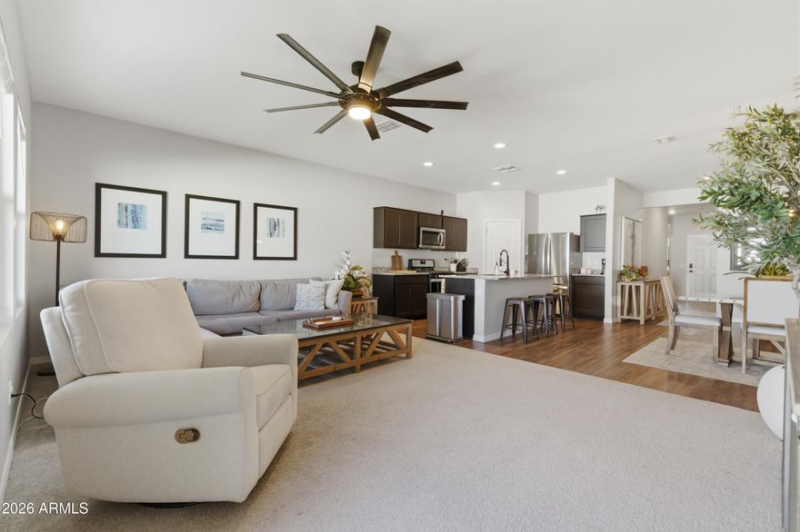 Welcome to this beautifully maintained 2020 home offering the perfect blend of modern finishes and true move-in ready convenience, without the wait, added costs, or construction of new builds.

Featuring 3 bedrooms, 2 bathrooms, & an open-concept layout, this home is designed for both comfort & functionality. The kitchen flows seamlessly into the living and dining areas, creating an ideal space for everyday living & entertaining.

Unlike new construction, this home is fully complete and ready for immediate move-in, including a finished backyard, saving you time, money, & hassle.

Seller is offering $10,000 in concessions (with a full priced offer), giving you the opportunity to significantly reduce your monthly payment.

Located in a highly desirable area of Buckeye, this community known for its beautiful canyon views & scenic surroundings, offering a unique desert landscape feel that sets it apart. Just minutes away, the Verrado Marketplace is nearing completion, bringing new shopping, dining, & convenience to the area.

Skip the construction delays, added upgrade costs, & uncertainty. Move right into a home that's already done for you!