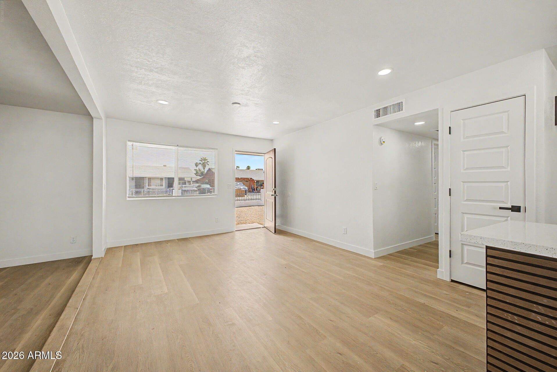 7214 W FLOWER Street