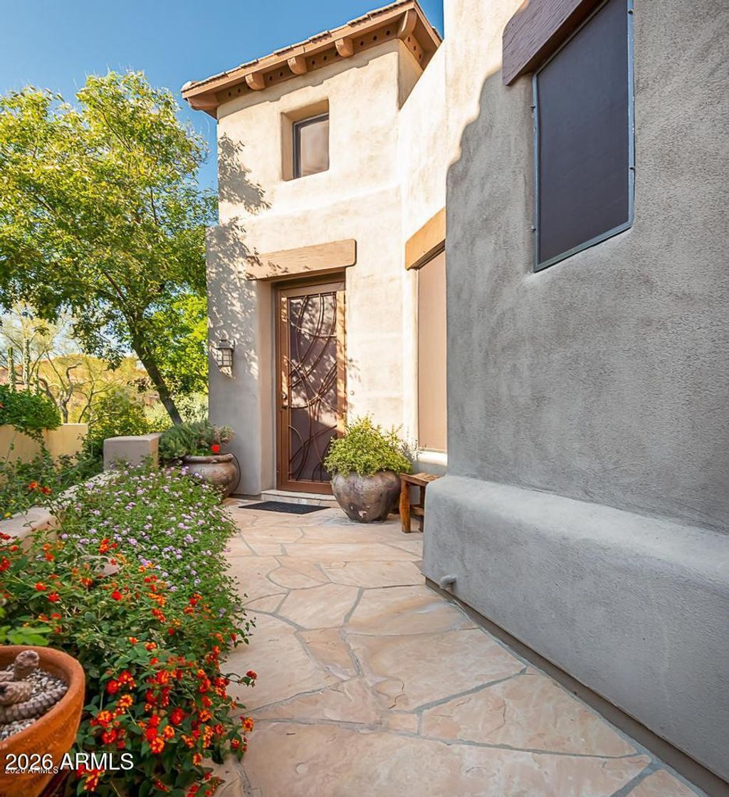 Photo of 9270 E Thompson Peak Parkway #303, Scottsdale, AZ 85255 (MLS # 7008987)