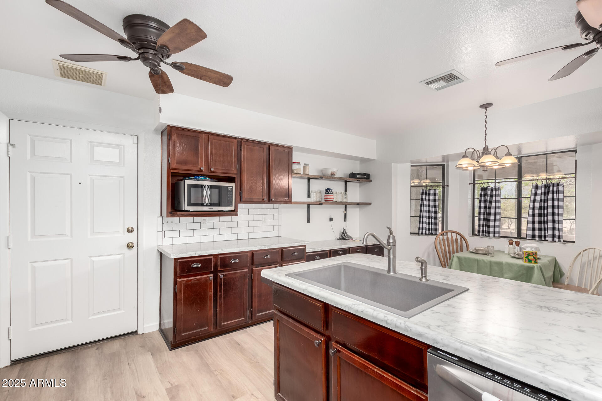 7117 N SARIVAL Avenue