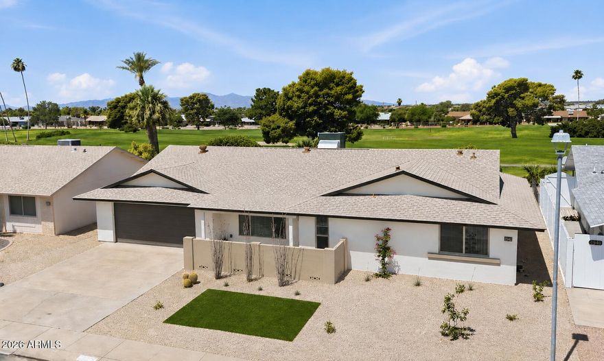 Stunning Golf Course Retreat! This exceptional recent renovation is truly beyond comparison, showcasing a thoughtful blend of functionality, style, and attention to detail! Flowing great room plan w/ fireplace and tile flooring. Open & bright kitchen features quartz counter tops, custom cabinets, KitchenAid appliances, & large island perfect for entertaining. Two primary suites and a powder room, providing space and privacy. Third bedroom can also be utilized as a home office. Custom vanities and tile showers add a touch of elegance.  LED recessed lighting and ceiling fans throughout the home enhance the modern design. Inside laundry w/ cabinets. Stucco exterior, dual pane windows & drs., HVAC-'26, 2 car garage, & golf cart garage. Inviting covered patio to enjoy the views! This is a 10!
