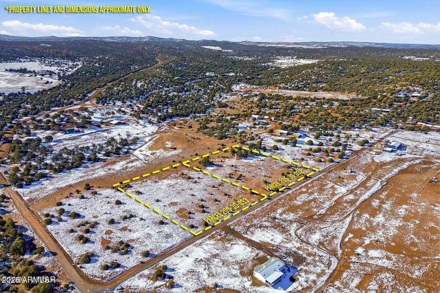 ***BEAUTIFUL LAND IN THE HEART OF THE WHITE MOUNTAINS*** Located approximately 10 miles from downtown Show Low, this private nearly four-acre vacant lot sits in a quiet subdivision and offers beautiful views. The property is mostly level and well-suited for building your dream home. Utilities are nearby, including access to a shared well. Easy road access makes it ideal for either seasonal or full-time living. Parcel # 205-30-033 to convey with sale.
