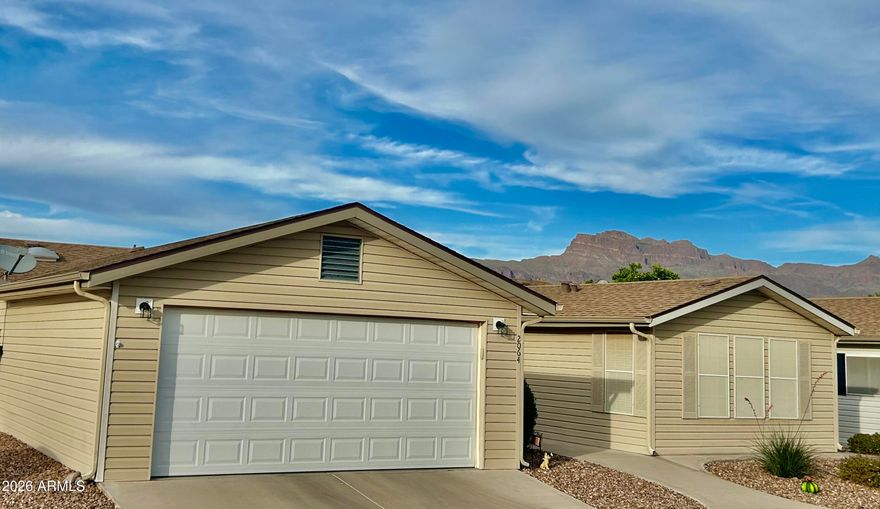 Wow! Plenty of space here w/over 2000 sq. split flr plan has a comfortable casita for guests. 3 bdrms. w/huge closets, 3 baths & Den. Screened in Arizona rm, & covered patio area out back. 2 Car Grge w/built in cabinets. The kitchen is nicely updated w/a pantry & SS appliances. Updated lighting & fans. Newer washer & dryer. Neutral tile flooring throughout. Home is partially furnished & move-in ready. Make this your Arizona home here at Dolce Vita 55+ (age qualified) Resort Community w/amazing views of the Superstition Mountains & most stunning sunsets. DV is a beautiful relaxing park community w/a 33,000 sq. clubhouse. Enjoy all the amenities inside and out. Heated pool, 2 spas, pickle ball, billiards, fitness gym, craft & card rms. 3 pet parks & even free RV, boat, trailer storage lot