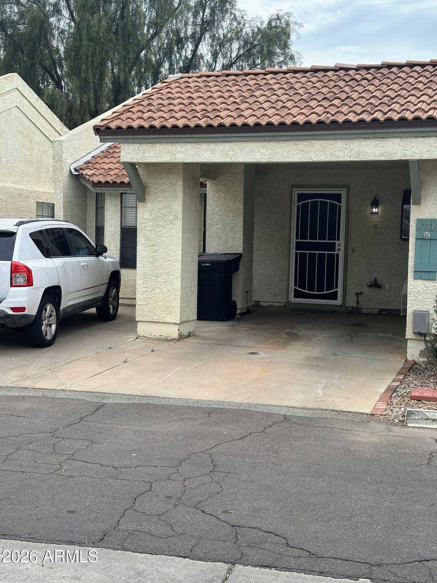 Cute 2 split bedroom unit; both bedrooms have en suite bathroom.Secondary bedroom and bathroom have justbeen updated. This is a beauty and priced to sell! Private carport in front, private patio in rear.
Interior stackable laundry machine. HVAC is a 3-ton unit replaced in 2020. HOA repaired roof in 2022.