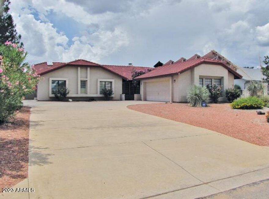 This spacious, 3BR/2BA/2CG, 2189 sq.ft. home on the PDS Golf Course in Sierra Vista, AZ is minutes from Ft. Huachuca, schools, shopping and Canyon Vista Medical Center. The open floor plan includes a large living area with wood-burning fireplace, a kitchen with plenty of prep area, a separate kitchenette off the garage, a walk-in tub 
in the hall bath and a jetted tub in the primary bath, central A/C and a large primary suite with access to the back patio. The yards are easy maintenance and there are gorgeous views of the PDS Golf Course and Huachuca Mountains. Call today.