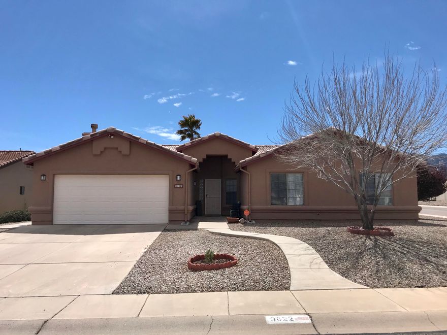 Beautifully updated and meticulously maintained home in Canyon De Flores neighborhood. This popular floorpan offers 4 bedrooms, 2 bathrooms and two separate living areas. Large kitchen updated with stainless steel appliances great for entertaining.  Family/dining room that is large enough to fit the whole family. The shiplap and stone framed fireplace is located in the den. A perfect place to wind down after a long day. This corner lot home offers AZ mountain views and a built in BBQ with plenty of room to play. Call today to schedule your showing.