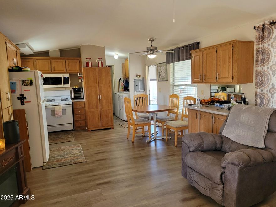 Warm and welcoming two bedroom, fully furnished home in the gated, active adult, 55+ community of Trail Riders Ranch! 
This home features hard floors throughout, a new water heater, a corner lot and so much more! Enjoy community events, the community pool, fitness center and clubhouse! Centrally located in Mesa, there is always something to do!