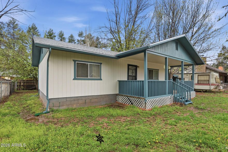 This is a great entry level escape to the pines, site built, single level home on a fully fenced lot with apple trees. Large front porch for relaxing, Living room is warmed by a gas wood stove, the spacious eat in kitchen with washer and dryer creates a functional and welcoming space. There are two comfortable bedrooms with plenty of storage and a separate bonus building that makes a great hobby space or extra sleeping area. There is an additional storage shed for your gear. The perfect spot for a simple, peaceful getaway in the pines.