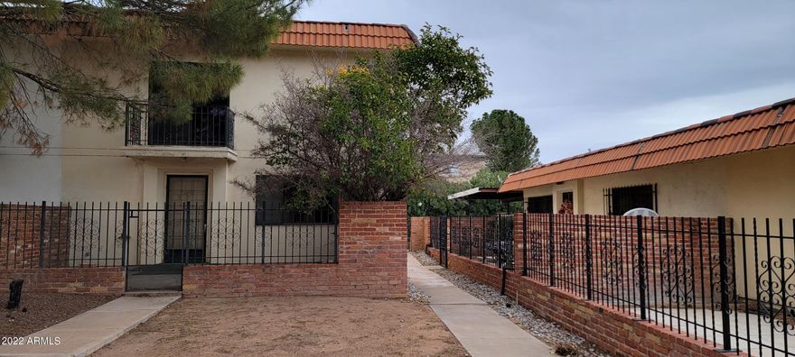 Here is a great opportunty to purchase a reasonably priced property that would make a great starter home or rental unit, perfect for snow birds too. This townhome is a 2 story end unit with a 2 car carport. Both bedrooms are upstairs and there is a full bath upstairs. 1 bedroom also has a balcony that overlooks the common area towards the community pool. Downstairs there is a 1/2 bath, living, dining and kitchen. There is a laundry room in a room in the carport and the washer and dryer remain.