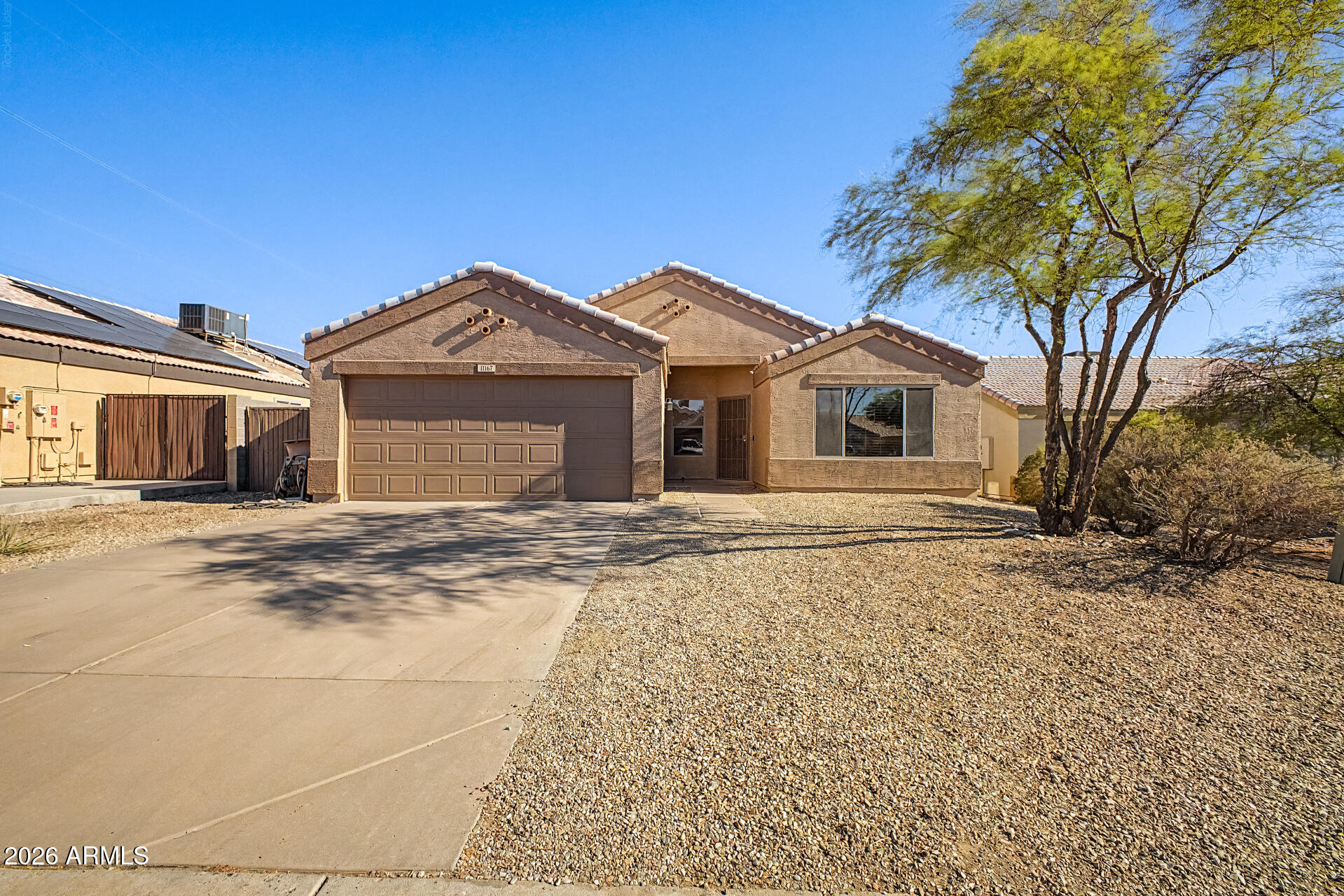 11167 W HARMONT Drive