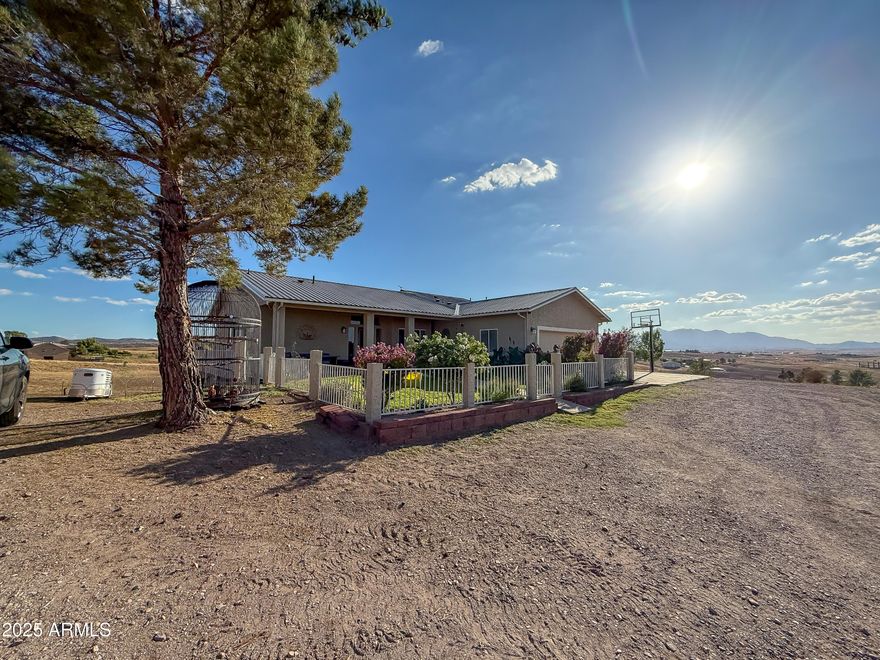 Welcome to 2804 Highway 83 in the heart of Sonoita, Arizona—an exceptional opportunity offering flexibility, space, and the peaceful lifestyle that southern Arizona is known for. This charming 4-bedroom, 3-bathroom home sits on a total of 8.18 acres, which includes the sale of the adjacent 5-acre parcel, providing ample space for horses, a hobby farm, vineyard, or future development.
Spanning 2,478 sq ft, the home is thoughtfully designed for versatility with two fully functional levels. The main floor offers a spacious layout with comfortable living areas, a well-equipped kitchen, and expansive views of the surrounding grasslands and mountains. Downstairs, the lower level features a private entrance, kitchenette, and dedicated heating and cooling systems, making it ideal for multi-generational living, long-term rental income, or short-term vacation stays in Sonoita wine country.
Outside, the property is fully fenced, features a storage shed, milking barn, chicken coop, and two covered stalls, and is equipped with a private well and well house, providing you with the privacy, independence, and space to enjoy the country lifestyle truly. Just minutes from local wineries, shops, and trails, and with easy access to Highway 83, this property offers both seclusion and convenience.
Whether you're looking for a full-time residence, an investment property, or a getaway in one of Arizona's most scenic regions, this property is packed with potential. Experience the beauty, space, and freedom of life in Sonoita!
