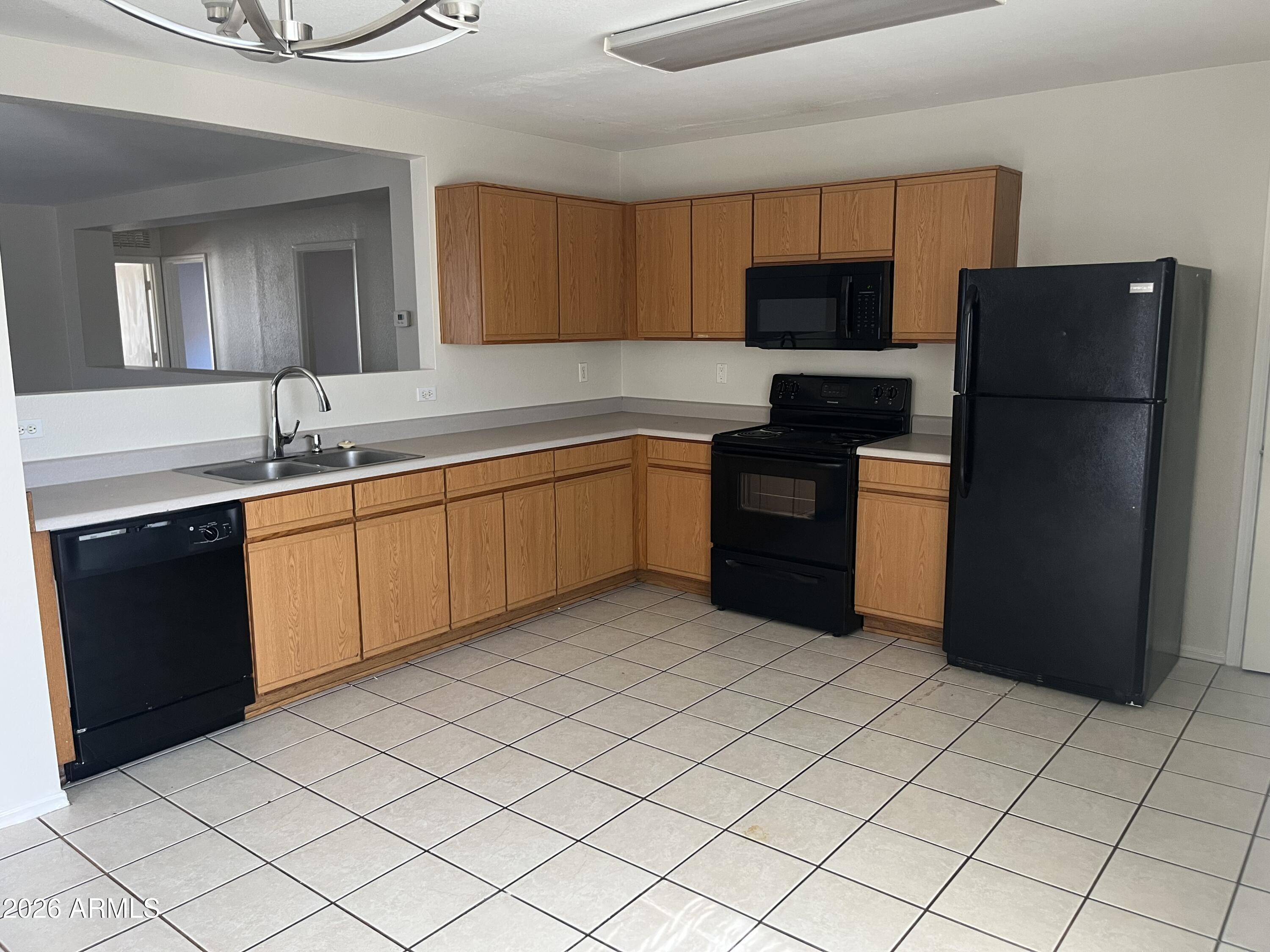 11796 W DAHLIA Drive