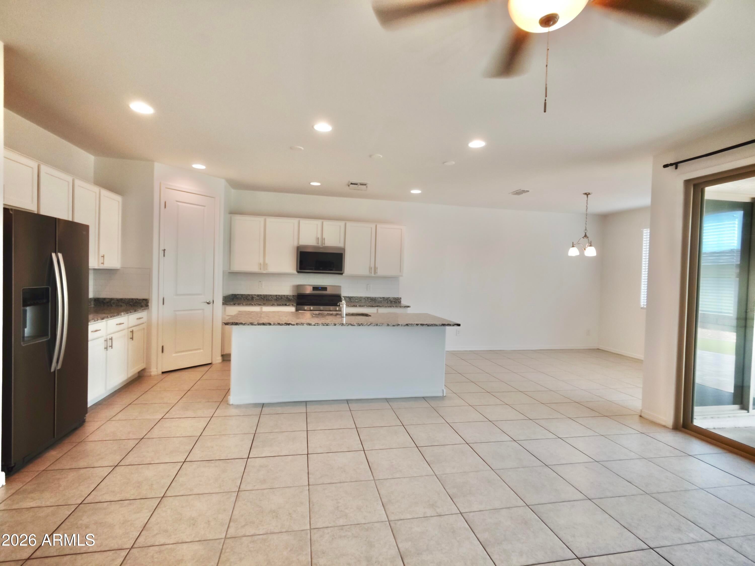 11241 E ULYSSES Avenue