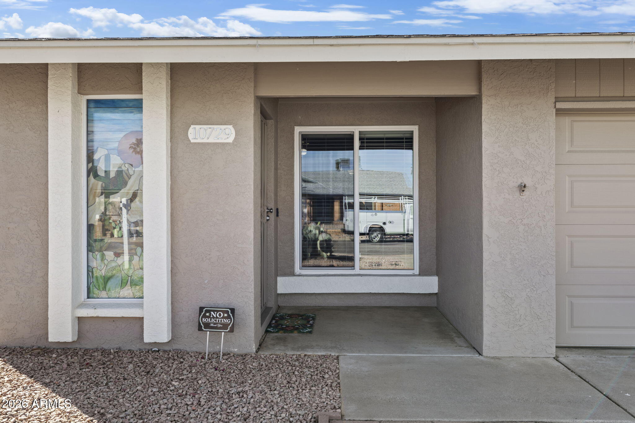 10729 W BELMONT Avenue