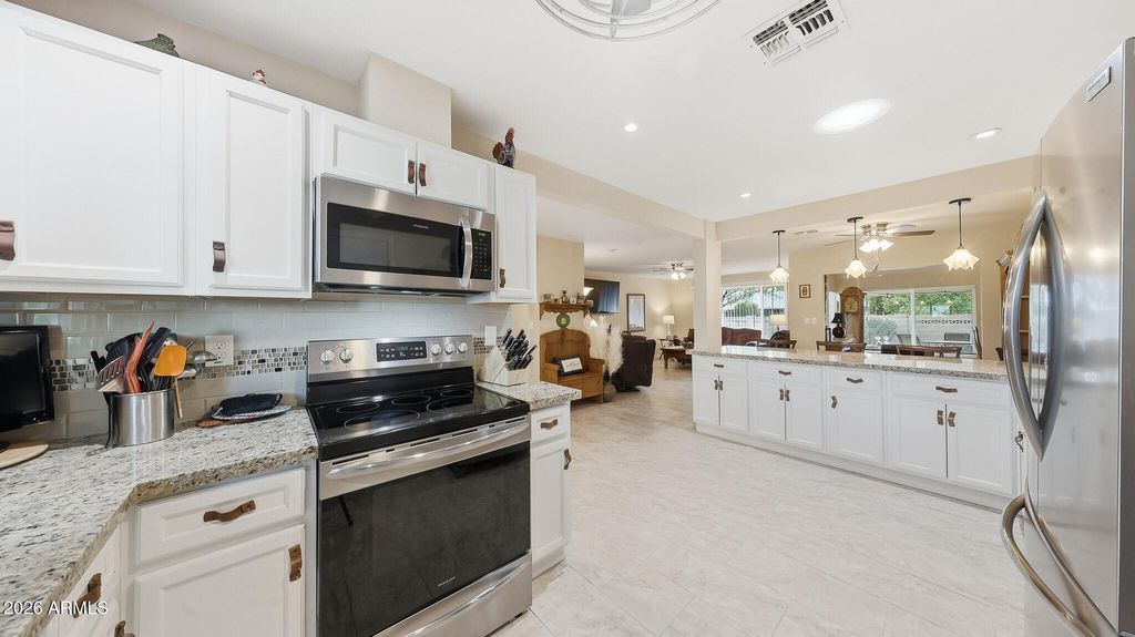 Photo of 9939 W Concord Avenue, Sun City, AZ 85351 (MLS # 6967586)