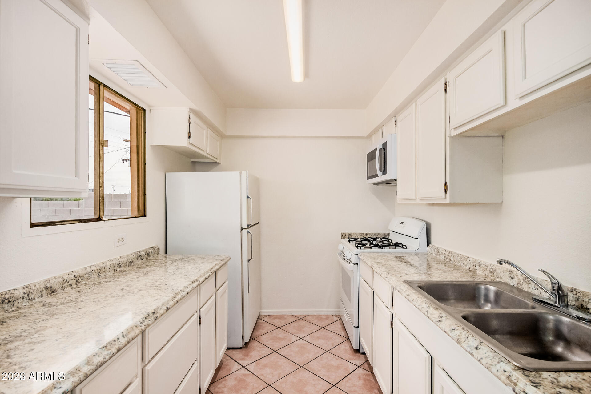 7937 W PINCHOT Avenue