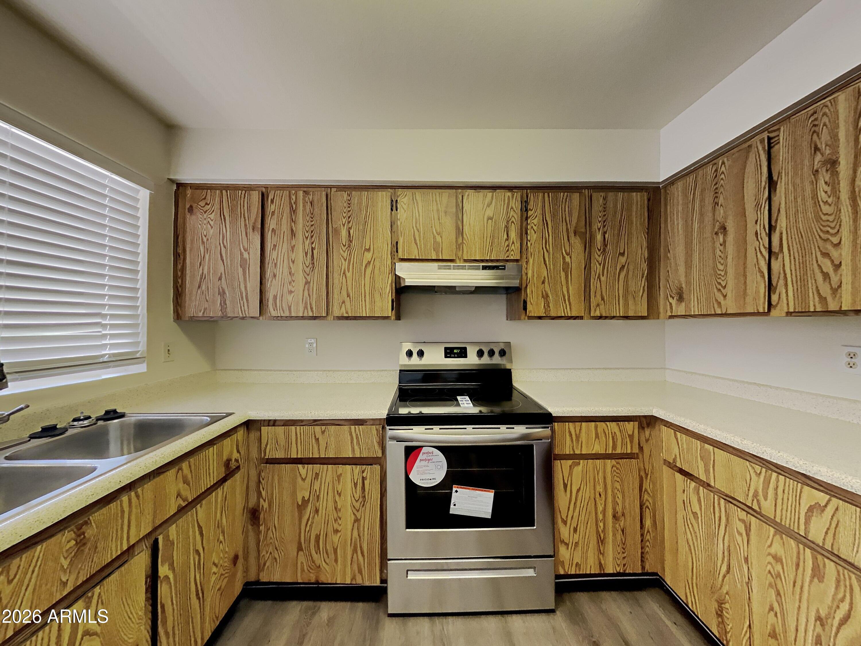 7034 W PURDUE Avenue