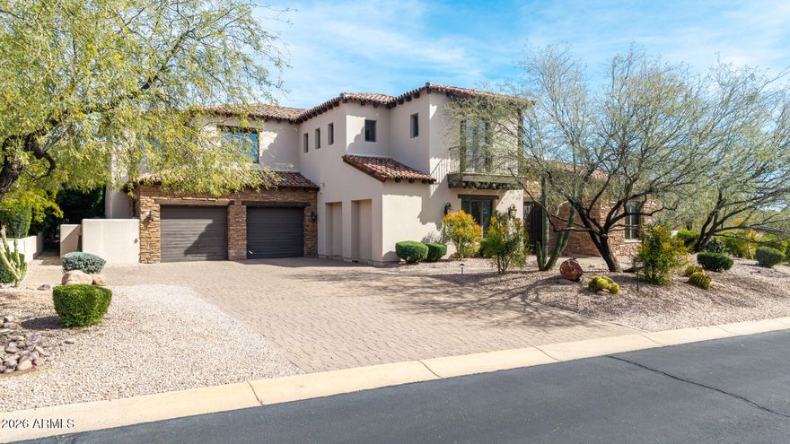 Timeless architecture blends with wonderful new updates in this luxury home in SUPERSTITION MOUNTAIN GOLF & COUNTRY CLUB! You must see to appreciate the quality and care, over 4500 sq ft with beautiful and very private outdoor spaces, this 2 level home features a NEW ELEVATOR for your convenience, NEW quartz counters and backsplash, NEW white marble sink and NEW Bosch dishwasher in kitchen, NEW pool/spa in 2020, backyard remodel in 2020, ALL NEW interior paint in 2024 and more! Enter your welcoming courtyard, the front entry inside is spacious and open to the dual stairways to your private ensuite rooms. Lovely travertine tile featured throughout most of the home. The lower-level THEATER ROOM is a great for everyday use or those fun movie nights, but could also be converted to a main level primary suite, see plans in Documents tab. The spacious kitchen is open to great room and the recently added ARIZONA ROOM. Three gorgeous Canterra stone fireplaces are in the great room, Arizona room and the beautiful primary suite. The kitchen features custom cabinetry, new countertops and backsplash, Subzero fridge, Wolfe gas range and double ovens. The spacious primary suite has a sitting area, separate office area, fitness room, steam shower, dual vanities and large walk-in closet. There are two full ensuites guest areas, one being the private entry guest casita with front courtyard and backyard access, the other in their own upstairs private retreat. Don't miss the oversized garage with lifts to accommodate a total of 5 vehicles and lots of storage space. Home was also updated with tankless hot water system and reverse osmosis system. The outdoor living has multiple areas to enjoy your everyday Arizona living with new heated pool and spa, travertine pavers, synthetic turf, covered patio, seating areas, gazebo, built-in BBQ and zen garden. Welcome to Superstition Mountain, so much to do and see, great people, great golf and great living.