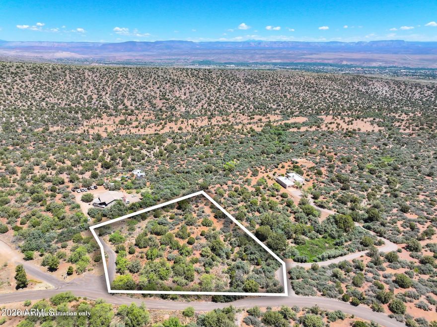 Nice flat lot with panoramic views with lots of mature vegetation for privacy. Perk test completed in 1998 for standard system. Beautiful neighborhood of custom homes waiting for your dream home!