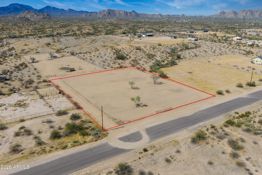 With Paved Road access and Beautiful Mountain Views this fully fenced lot is perfect to build your Dream Home/Ranch or can also be set up with a Manufactured Home and/or Barn. The location is close to HWY 84 with Shopping available in both Stanfield and Casa Grande or you can take HWY 347 and head to Harrah's Ak-Chin Casino, Ak-Chin Multi-Entertainment Center, Copper Sky Park or go Shopping in the City of Maricopa!