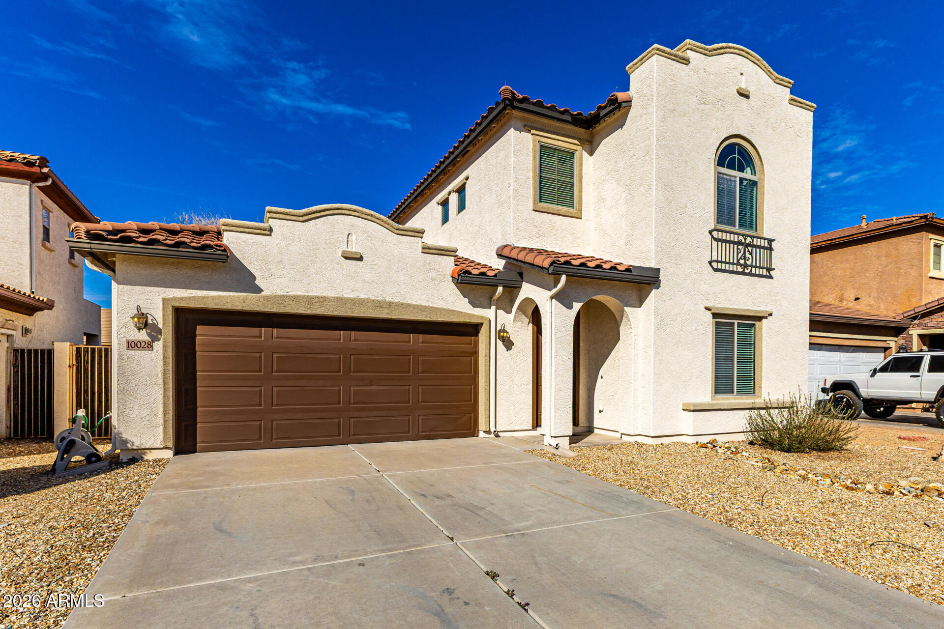 10028 W MARGUERITE Avenue