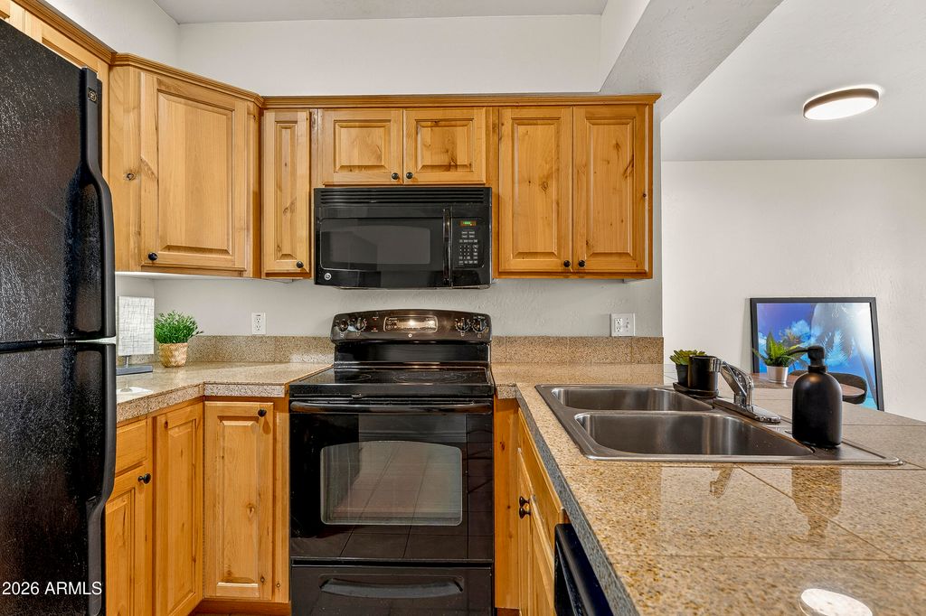 Photo of 3200 S Litzler Drive #4-214, Flagstaff, AZ 86005 (MLS # 7002105)