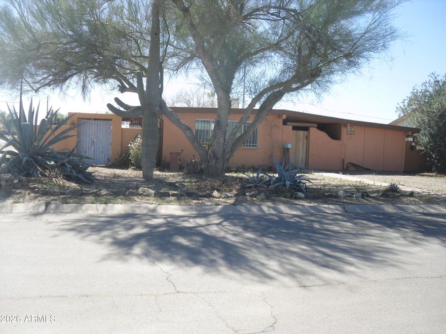 Stop the car!!  If you are looking for a mature property on a large corner lot in an established neighborhood with no HOA you are home!!  This property is a three bedroom one and three quarter bath with covered patios on both the east and west side of the house.  It has plenty of storage space as well as a large storage room that was used as a hobby room.  There is also an RV gate in the alley as well as one on the east side back yard fence.  The home is located close to shopping (Walmart, Safeway, Walgreens).