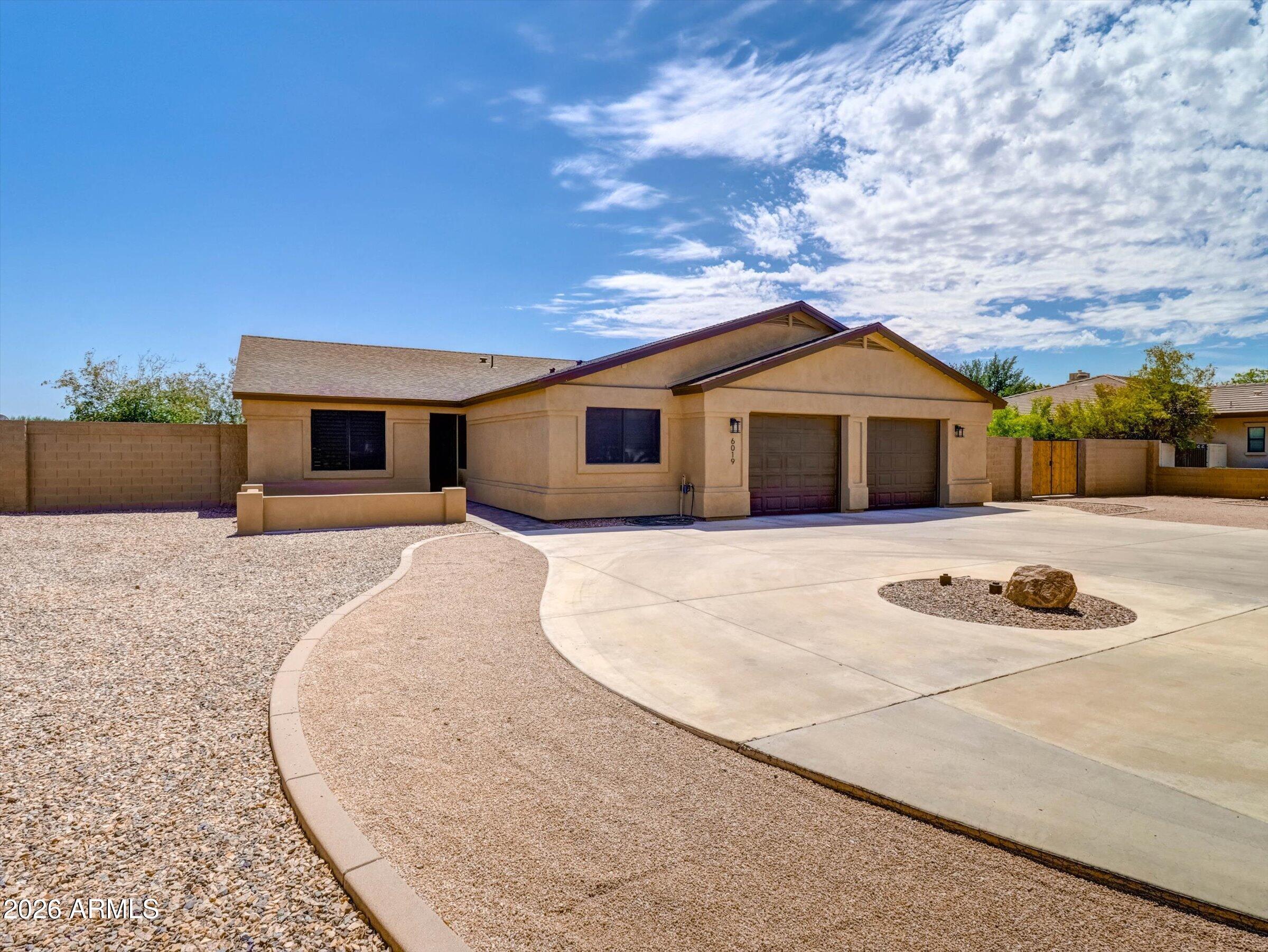 6019 W GREENBRIAR Drive