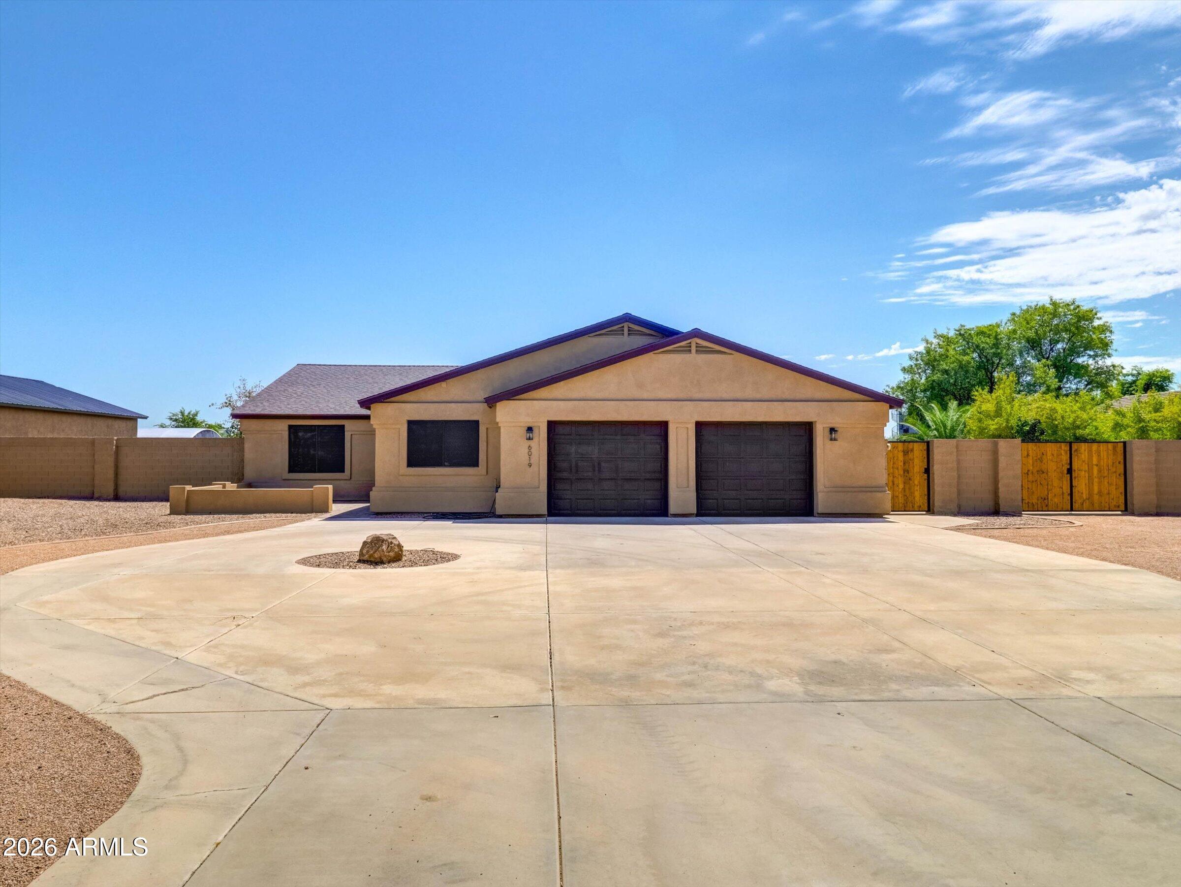 6019 W GREENBRIAR Drive
