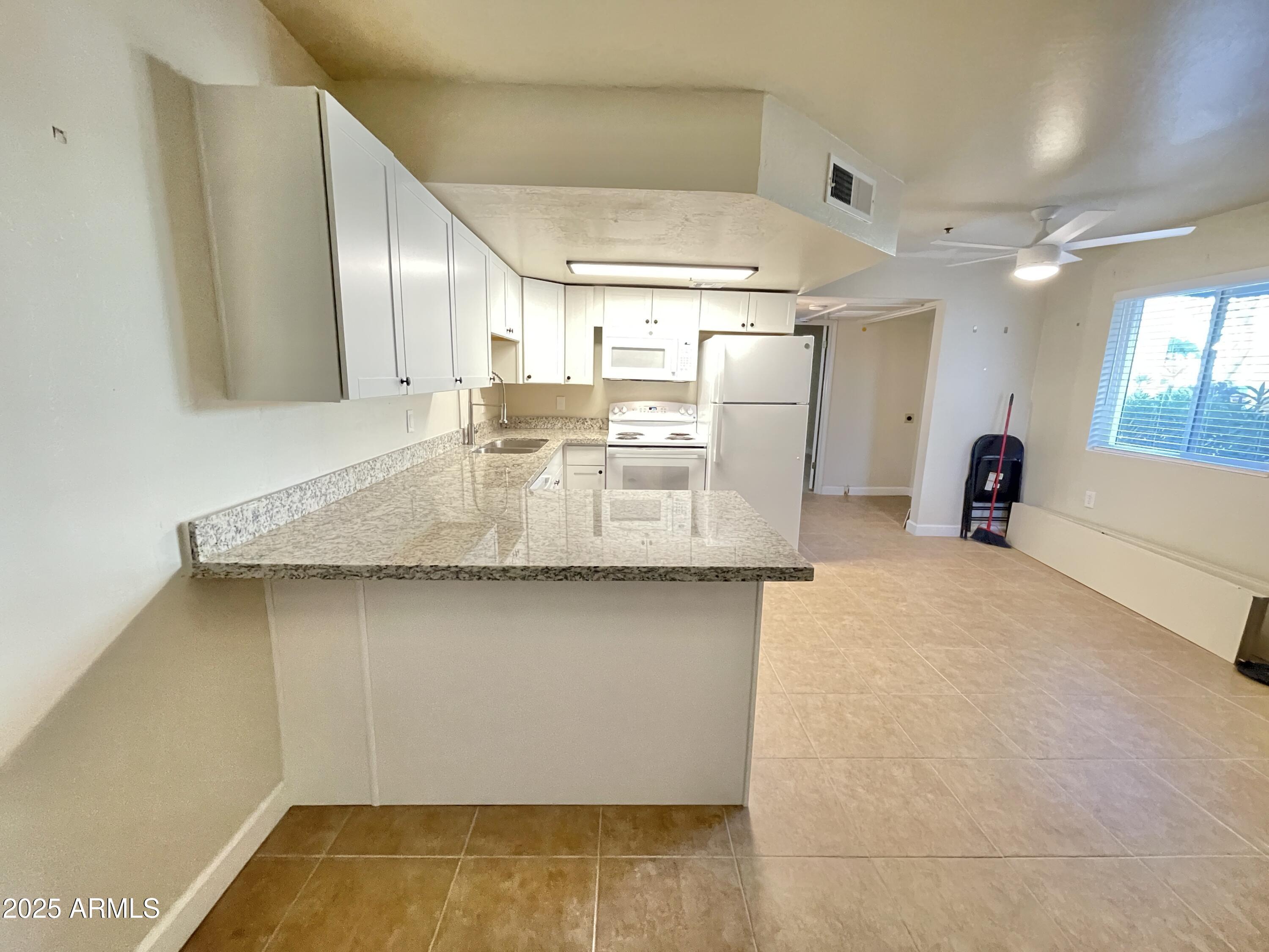 12221 W BELL Road 162