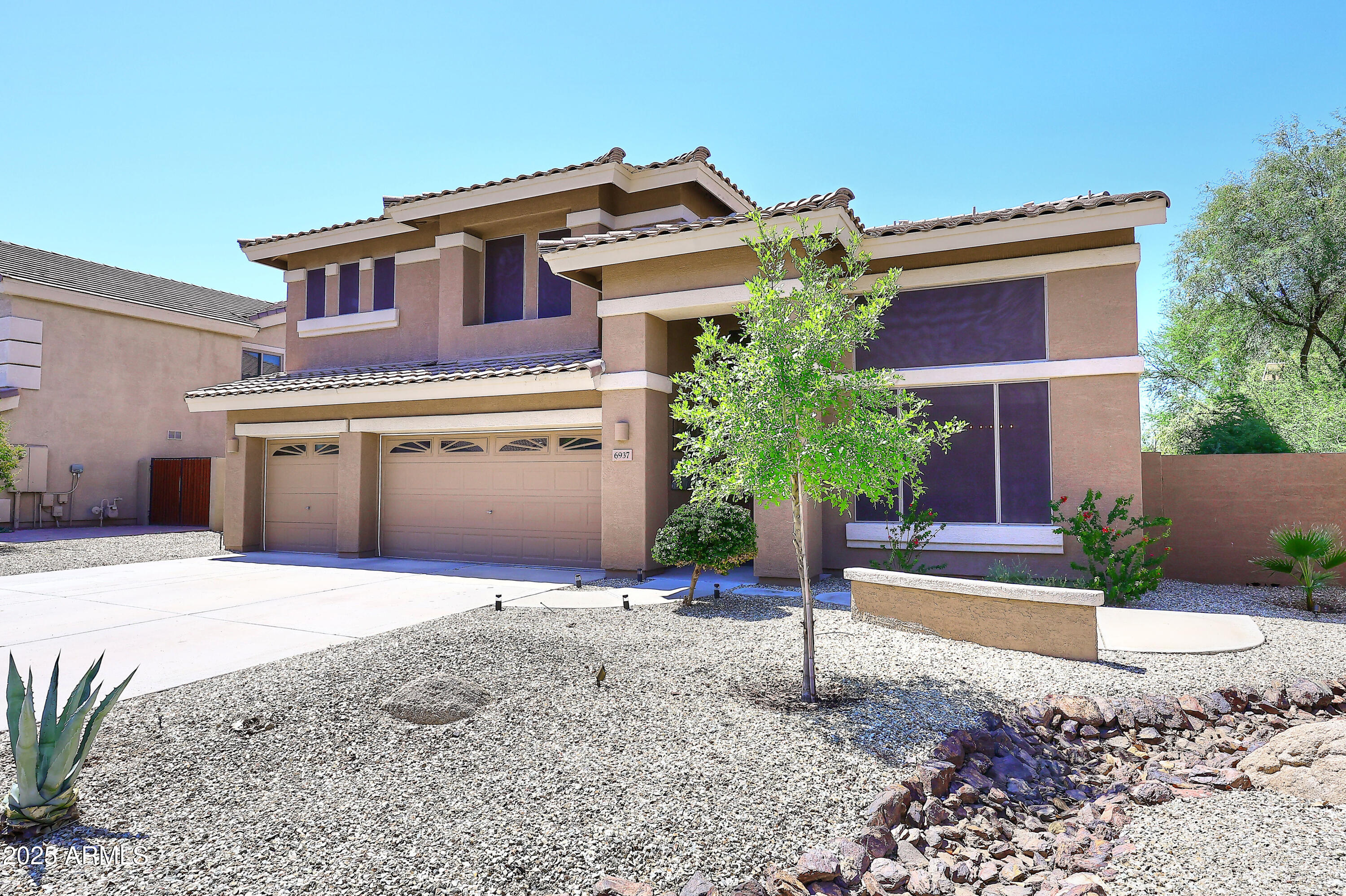 6937 W JACKRABBIT Lane