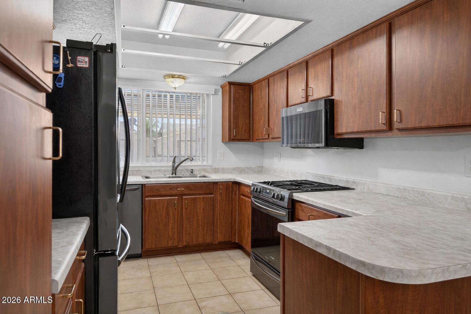 10437 W BUTLER Drive