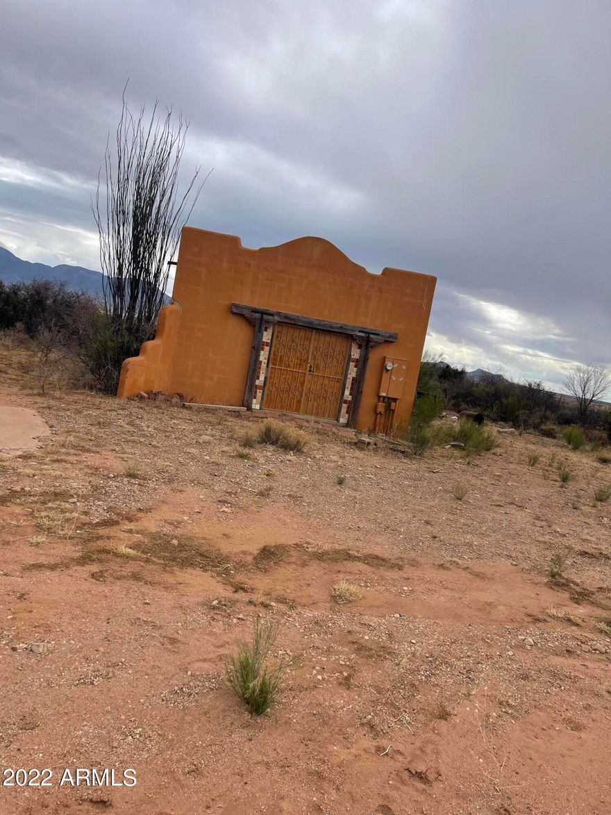 Great Investment Opportunity!  This quaint, Santa Fe style 1  bedroom, 1 bath home is waiting for some TLC!  Views galore, private well and sits on 30+ acres!  This property is being sold ''AS-IS''.  Priced to sell!  Don't wait, call TODAY!