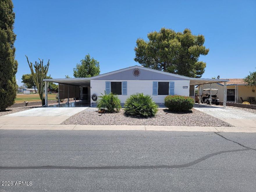 This is a lovely 2 bedroom 2 bath home on the golf course here in Florence Gardens, where you own the land!!The home offers pride of ownership! There is an Arizona room on the south side of home as well a a shed on the north side. Remodeled home with new flooring, cabinets and granite countertops, doors and new stainless appliances! There is a separate family room and living room as well as a dining room. This home has had a lot of work done to update the property and to be comfortable and stylish. Close to the clubhouse with pickle ball courts, heated pools and spas, golf course, craft rooms and more!